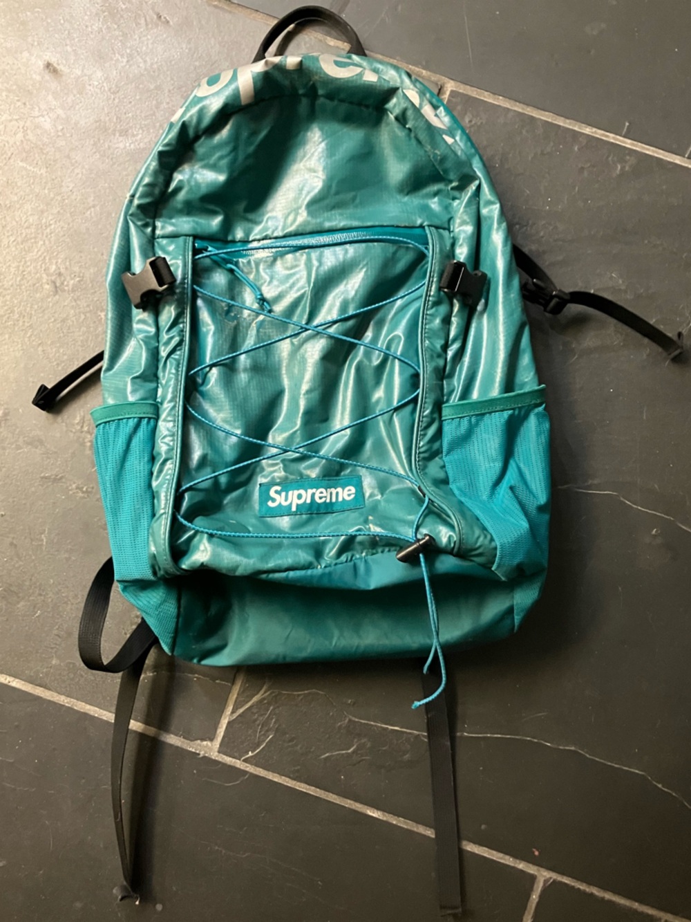 Supreme Green Backpack with slight discoloration